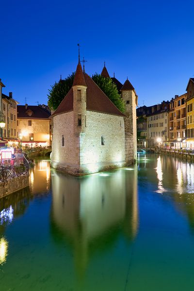 Annecy Haute Savoie France. The Palais de lIsle and Thiou river at sunset