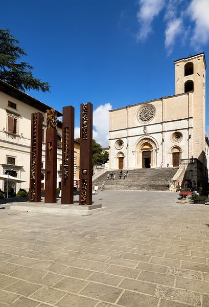 Todi Umbria Italy. Concattedrale della Santissima Annunziata. Cathedral. Piazza del Popolo. The statue Quattro Stele by Arnaldo Pomodoro