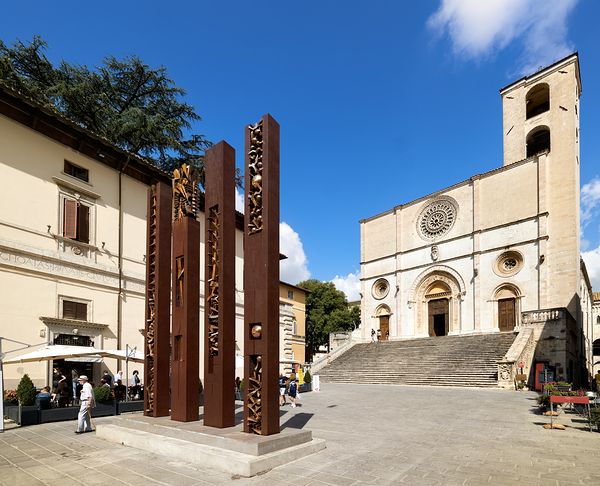 Todi Umbria Italy. Concattedrale della Santissima Annunziata. Cathedral. Piazza del Popolo. The statue Quattro Stele by Arnaldo Pomodoro