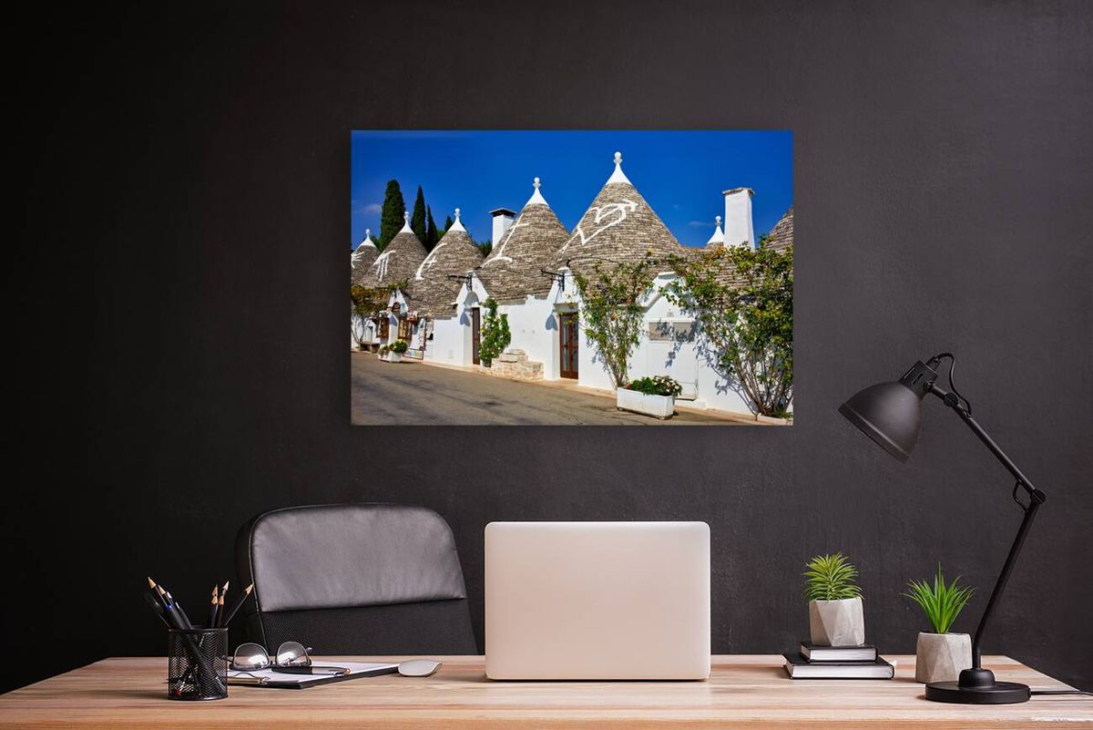 Apulia Puglia Italy. Alberobello. Trulli: traditional Apulian dry stone huts with a conical roof.