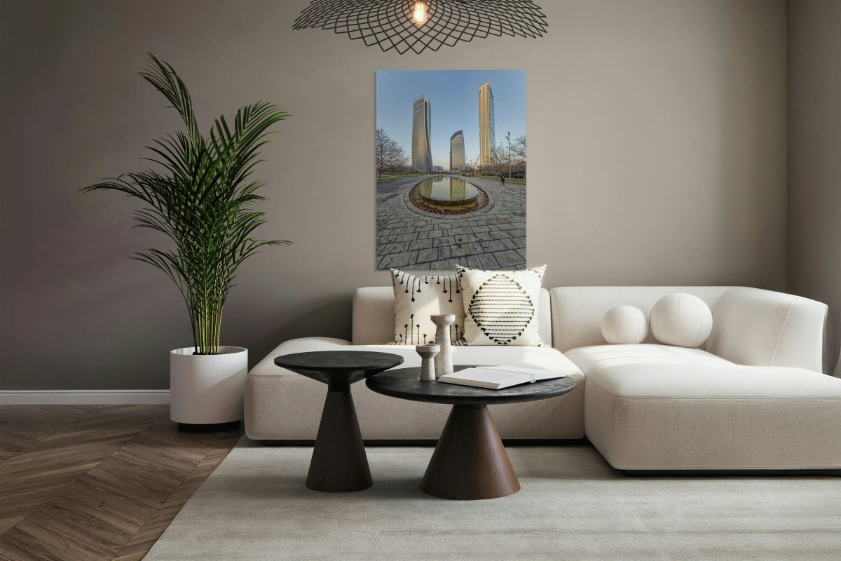 Milan Italy. Modern skyscrapers and reflective pond in a city pa