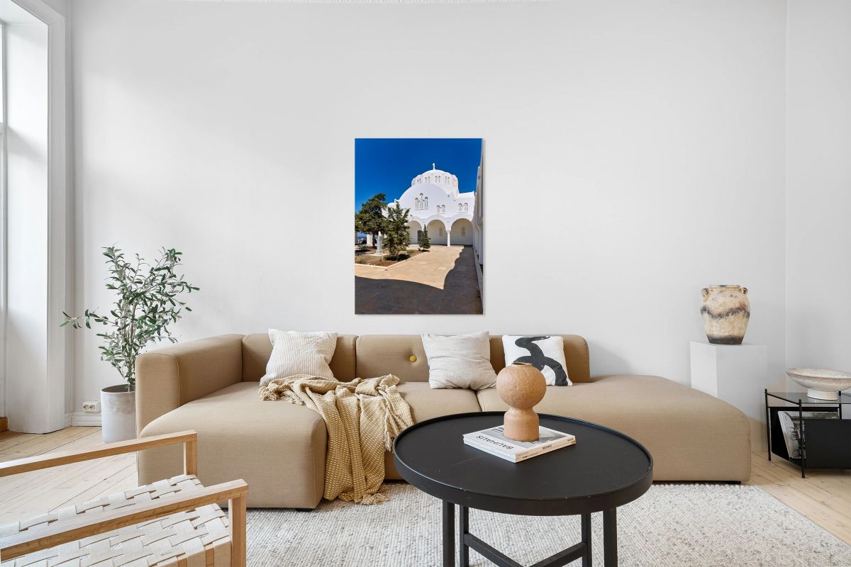 Beautiful white church green trees and blue sky.