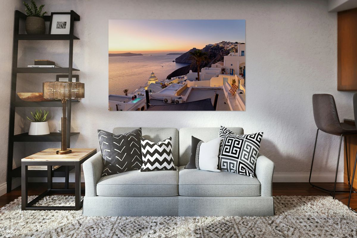 Scenic Santorini sunset white buildings overlooking the caldera