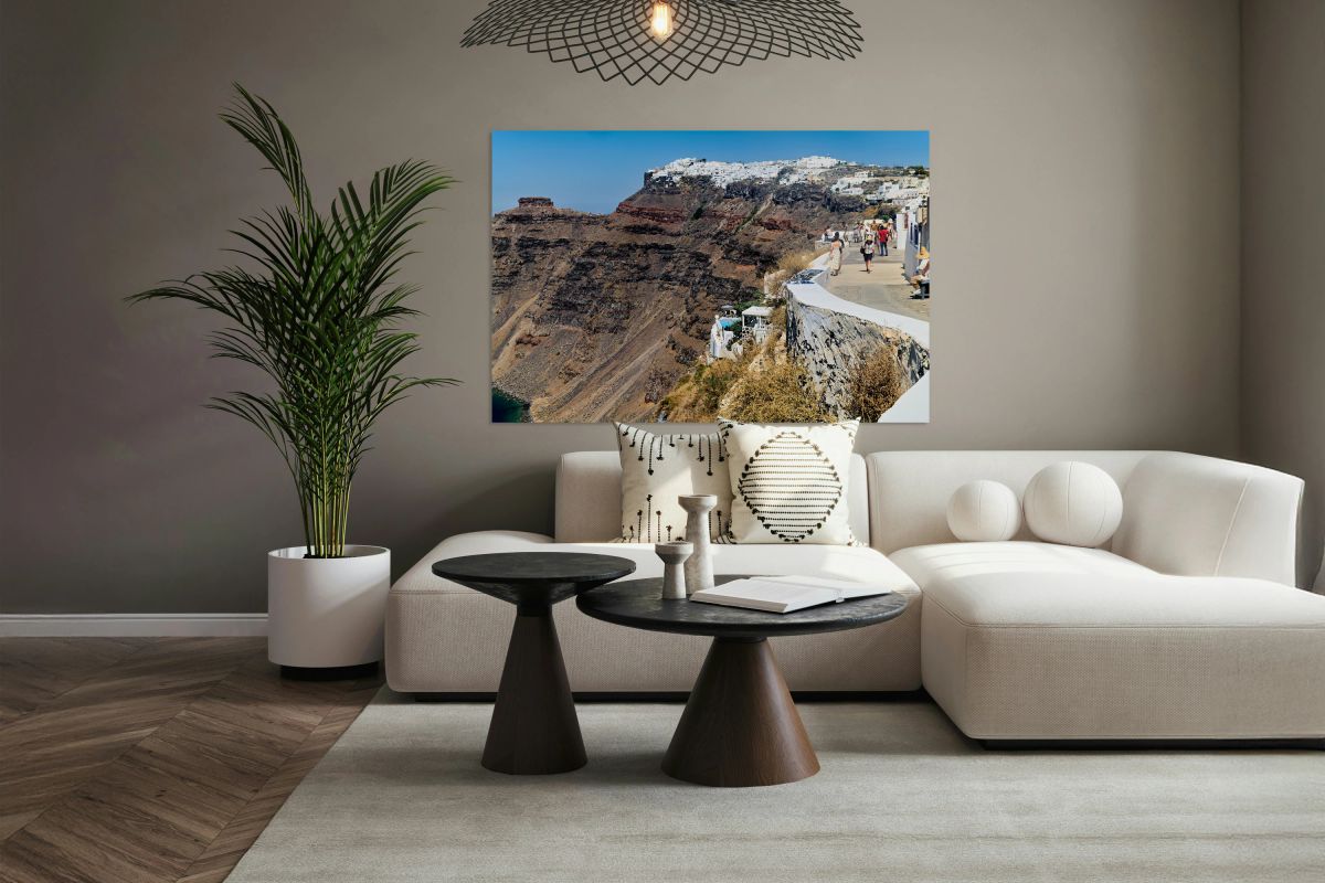 Scenic Santorini: white village caldera and tourists.