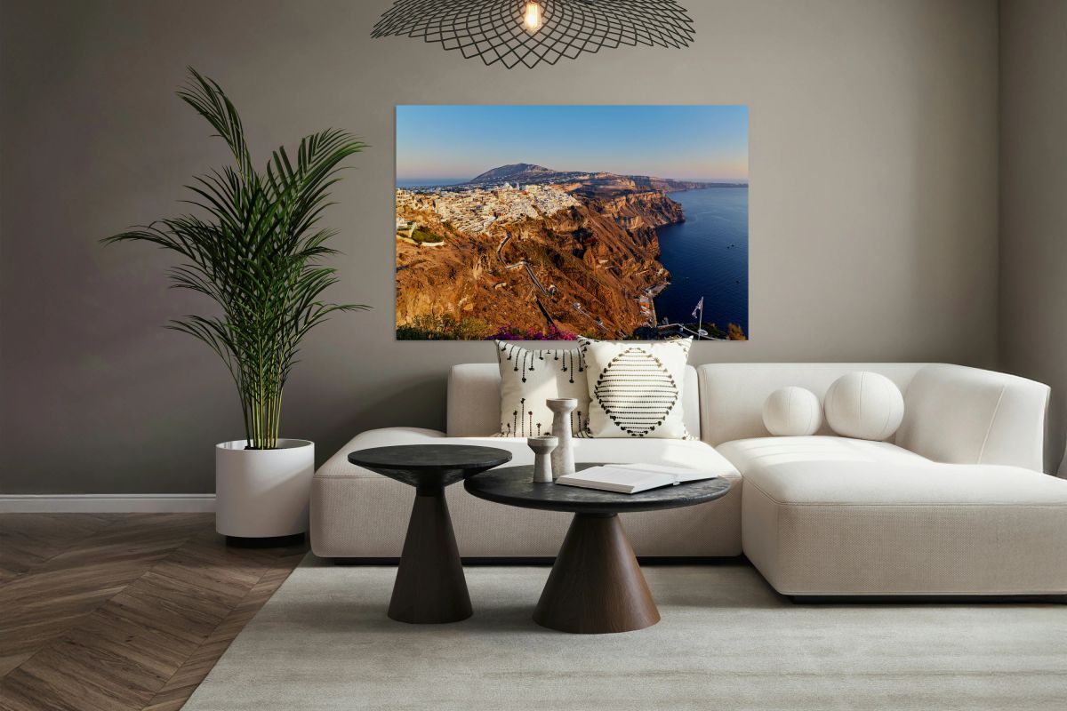 Santorinis iconic white village on caldera cliffs Aegean Sea.