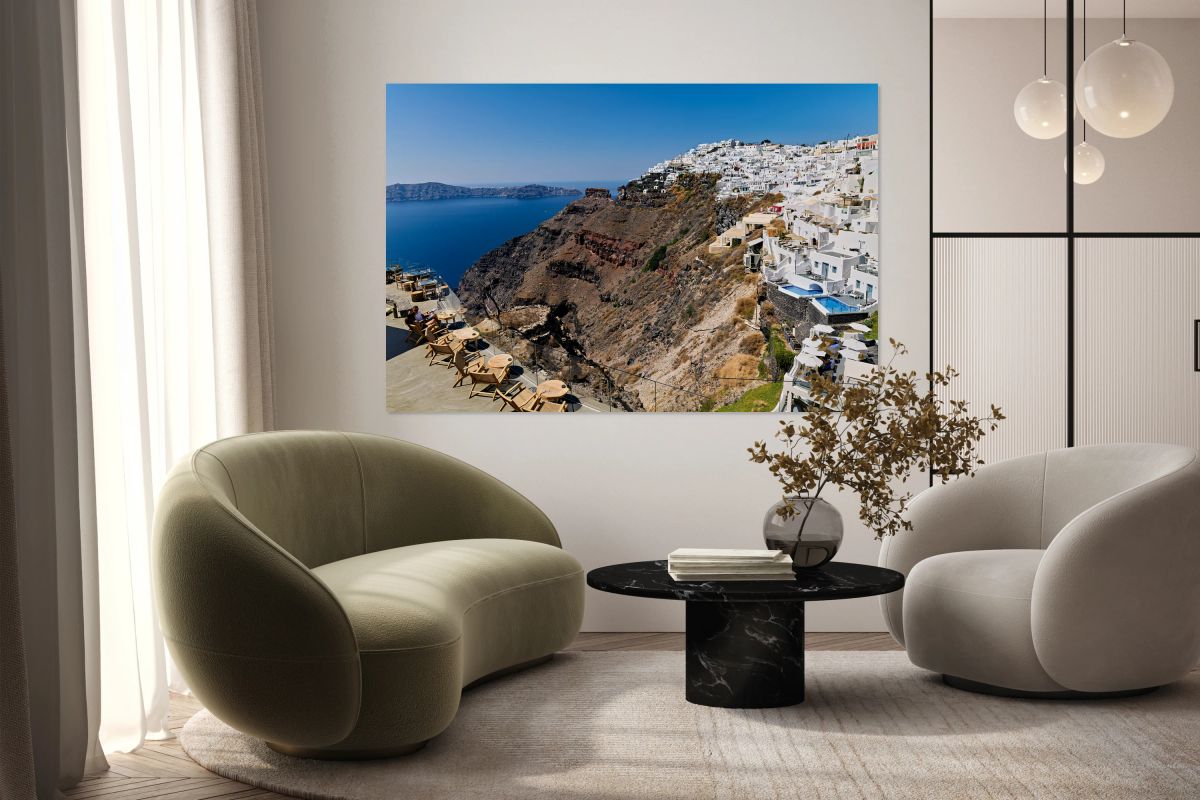 Santorinis white cliffside village and caldera view.