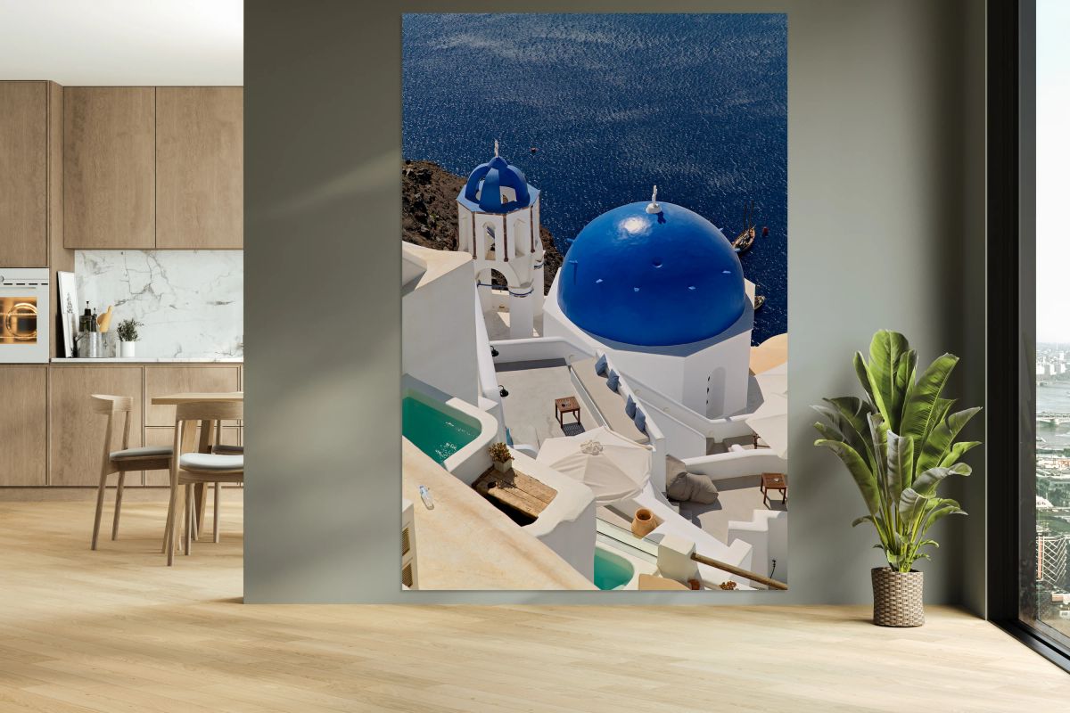 Santorinis iconic blue domes and white architecture overlooking