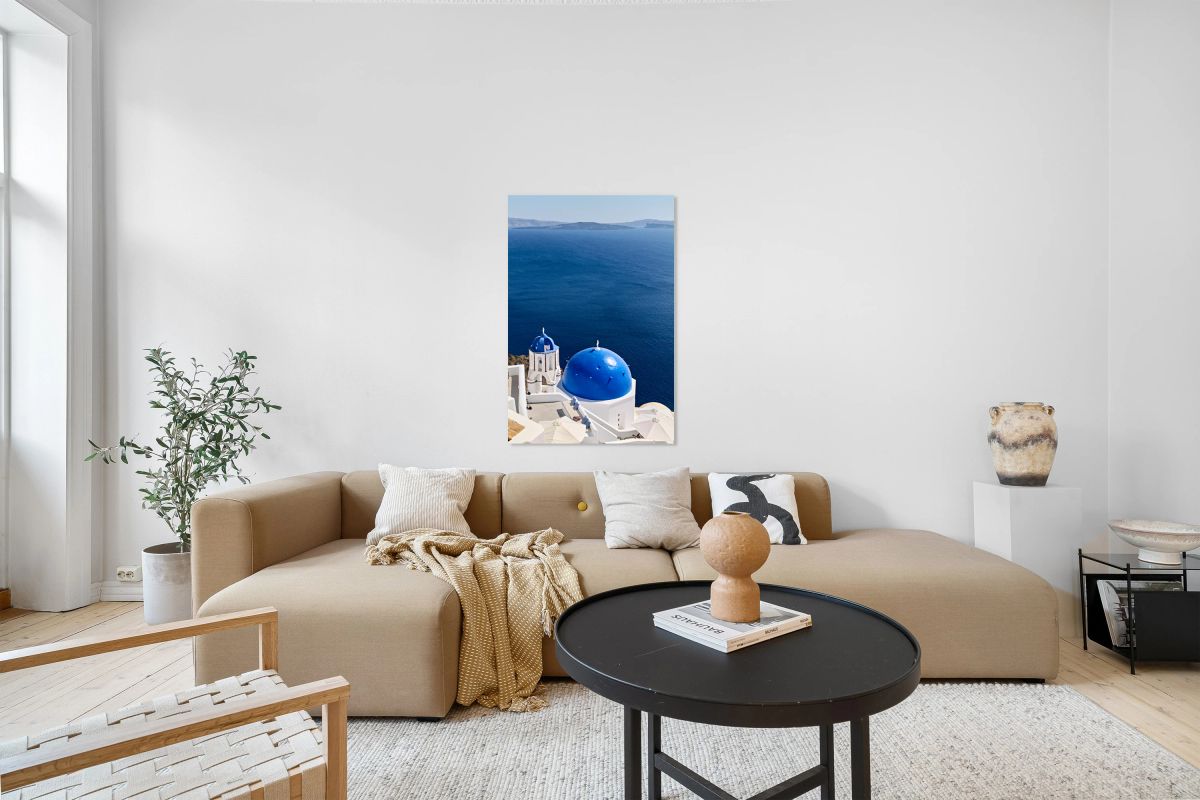 Santorinis blue domes and caldera view.