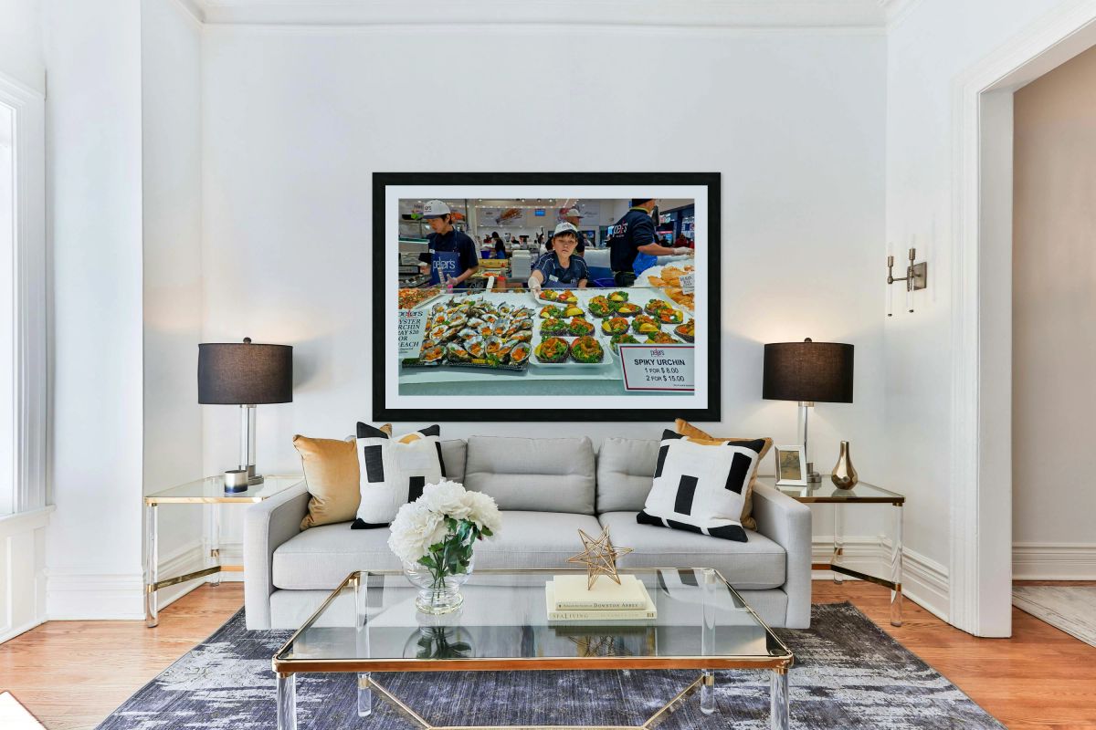 Fresh oysters and spiky urchin for sale at market.