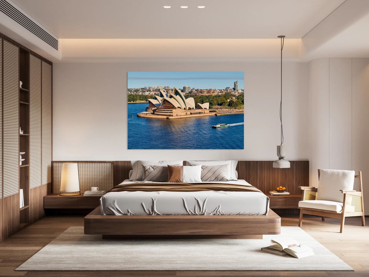 Sydney Opera House and harbor with ferry boat.