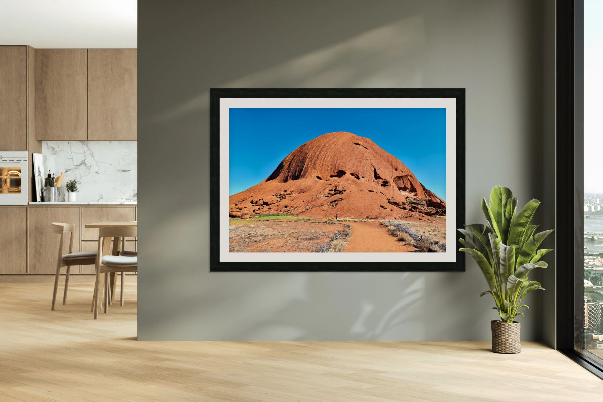 Uluru Australias iconic sandstone monolith under a clear blue