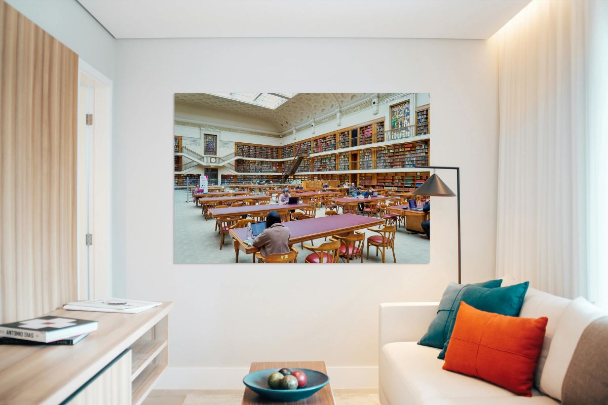 People study in the grand reading room of Mitchell Library in Sy