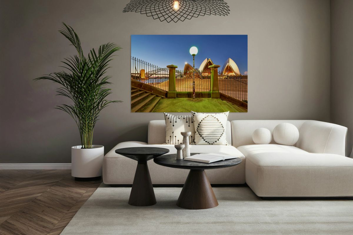 Sydney Opera House and Harbour Bridge at dusk.