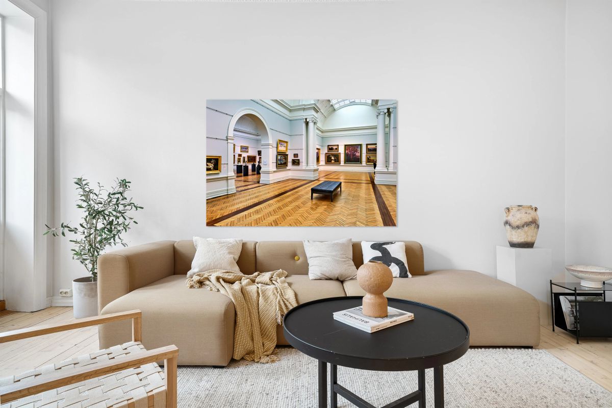 Art gallery interior with paintings and visitors in Sydney