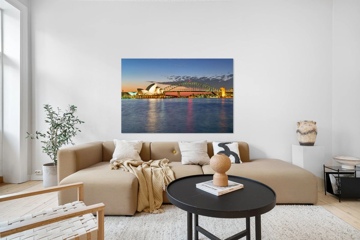 Sydney Opera House and Harbour Bridge at dusk.