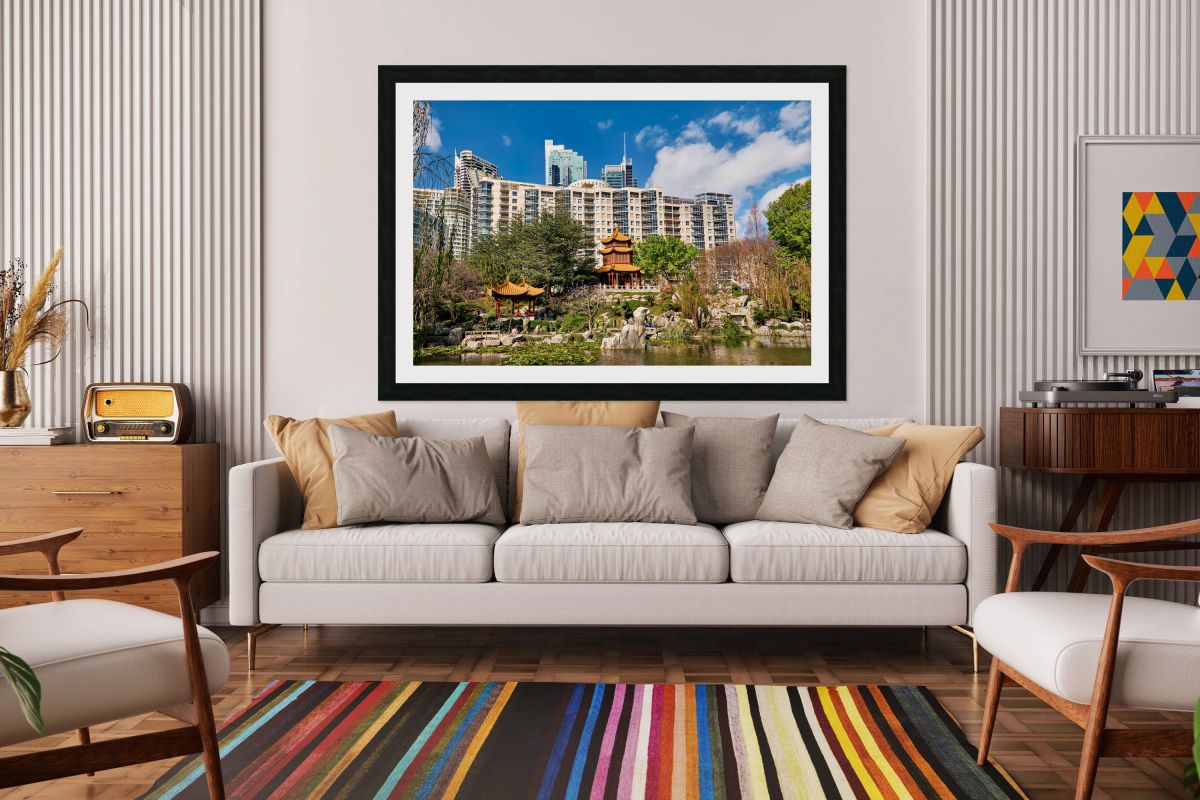 Chinese garden with pagodas and modern buildings