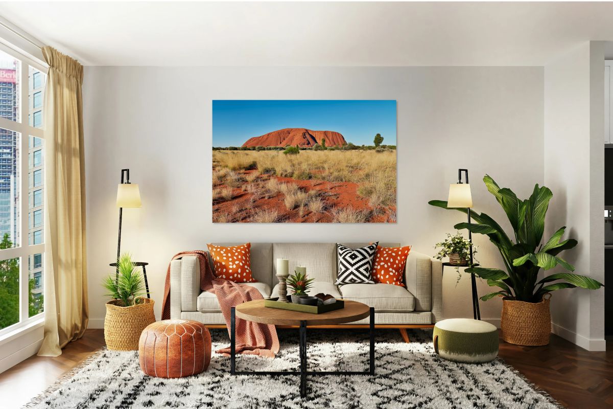 Uluru Australias iconic sandstone monolith under a clear blue