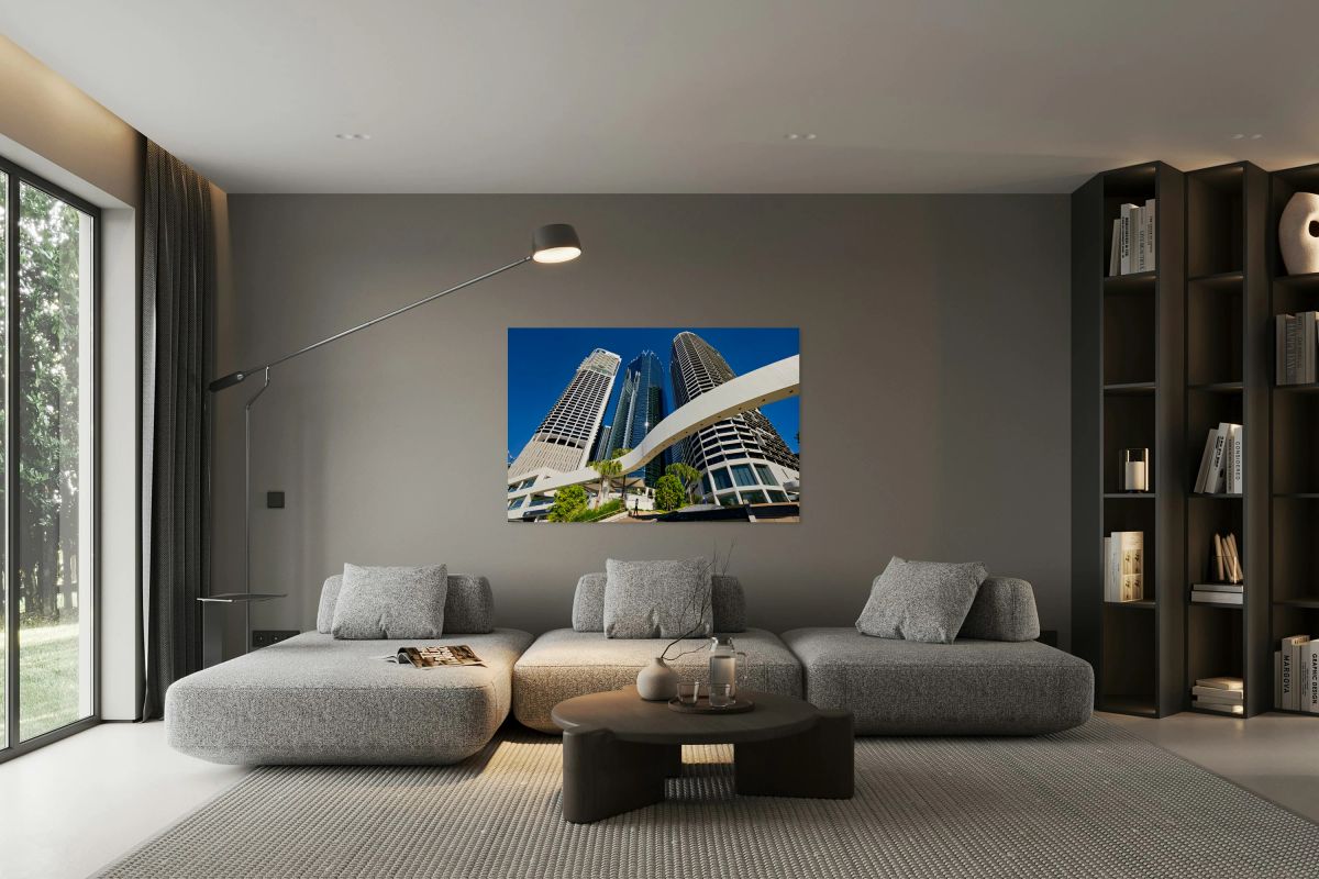 Woman walks on stairs in modern urban area with tall buildings