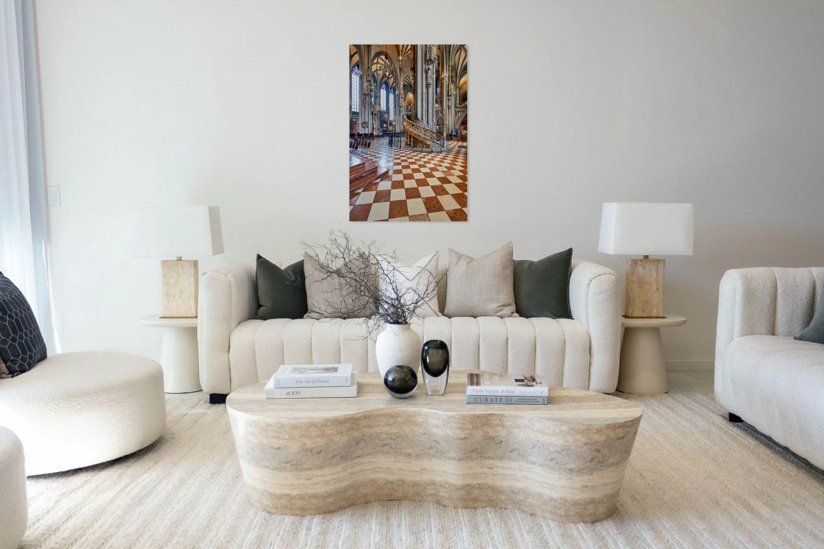 Ornate Gothic cathedral interior with checkered floor and spiral