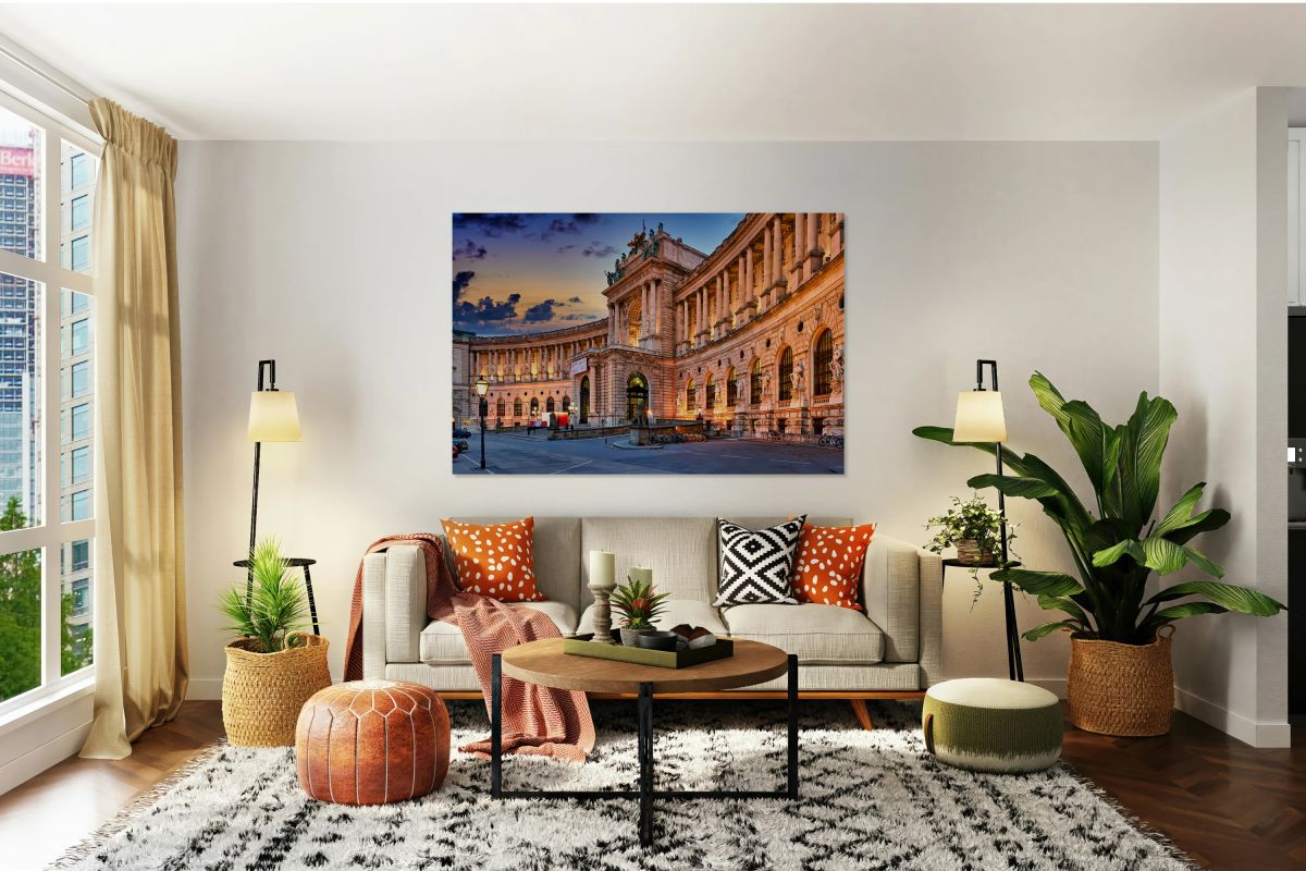 Hofburg Palace Vienna illuminated at dusk.