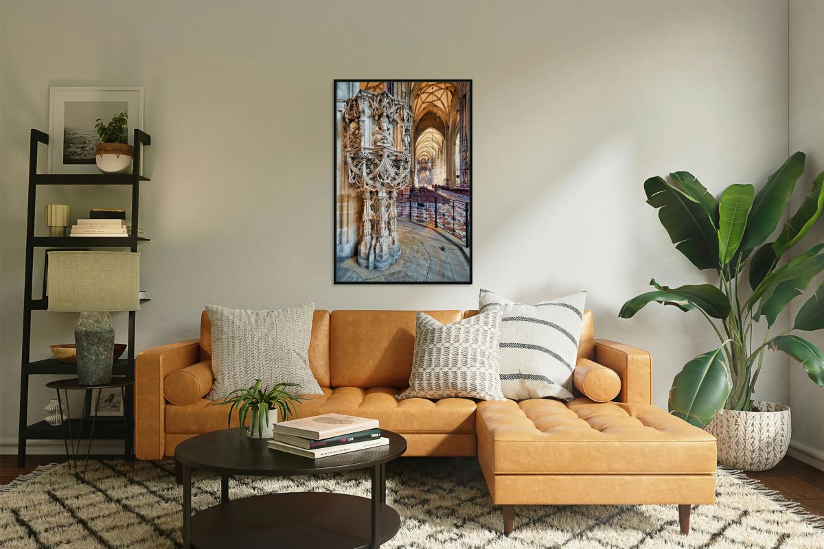 Ornate stone pulpit dominates a grand vaulted cathedral interio