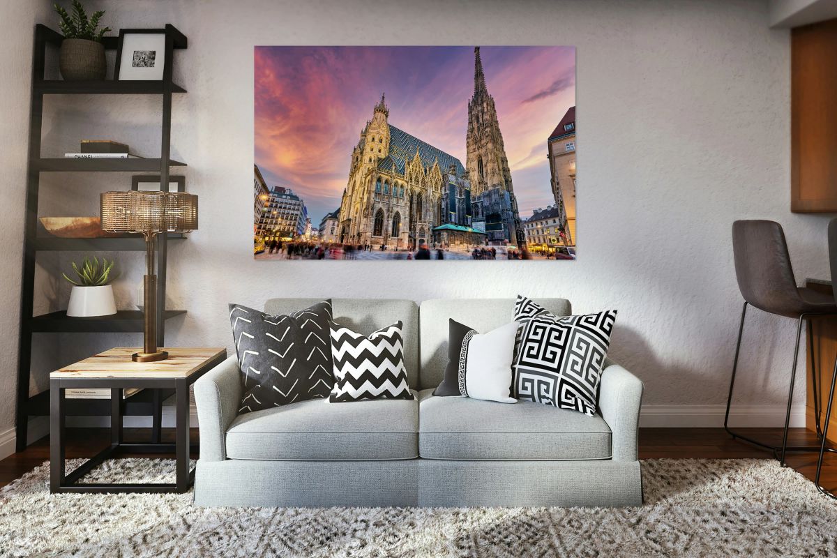Majestic St. Stephens Cathedral in Vienna under a colorful sky.