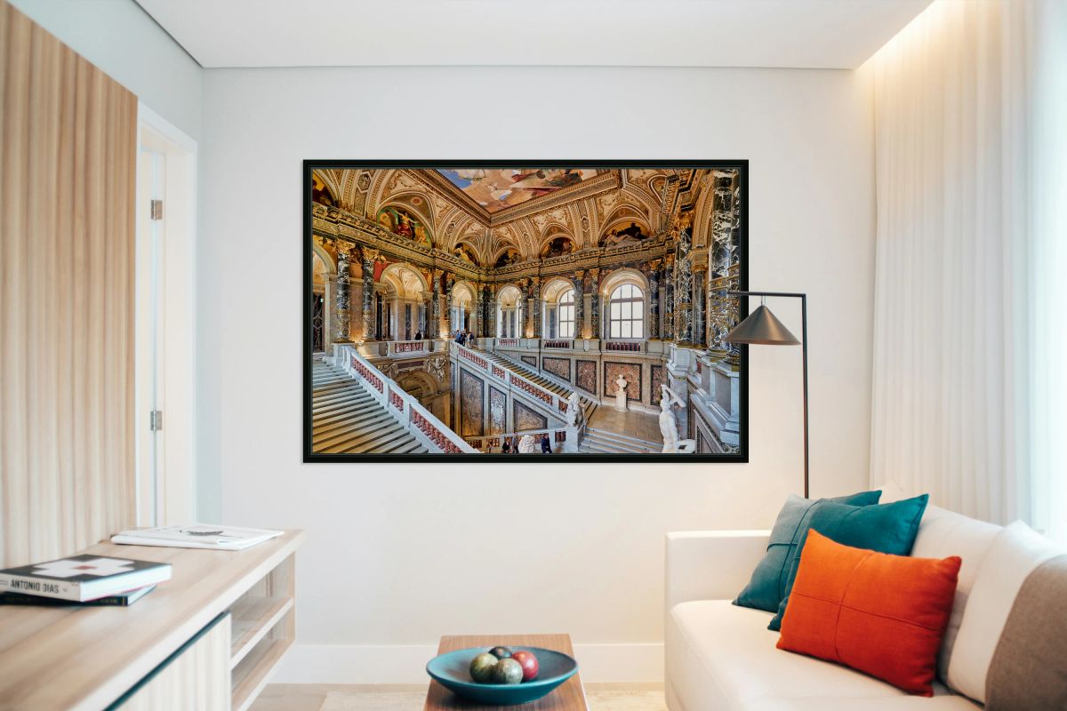 Opulent museum interior featuring grand staircase art and arch