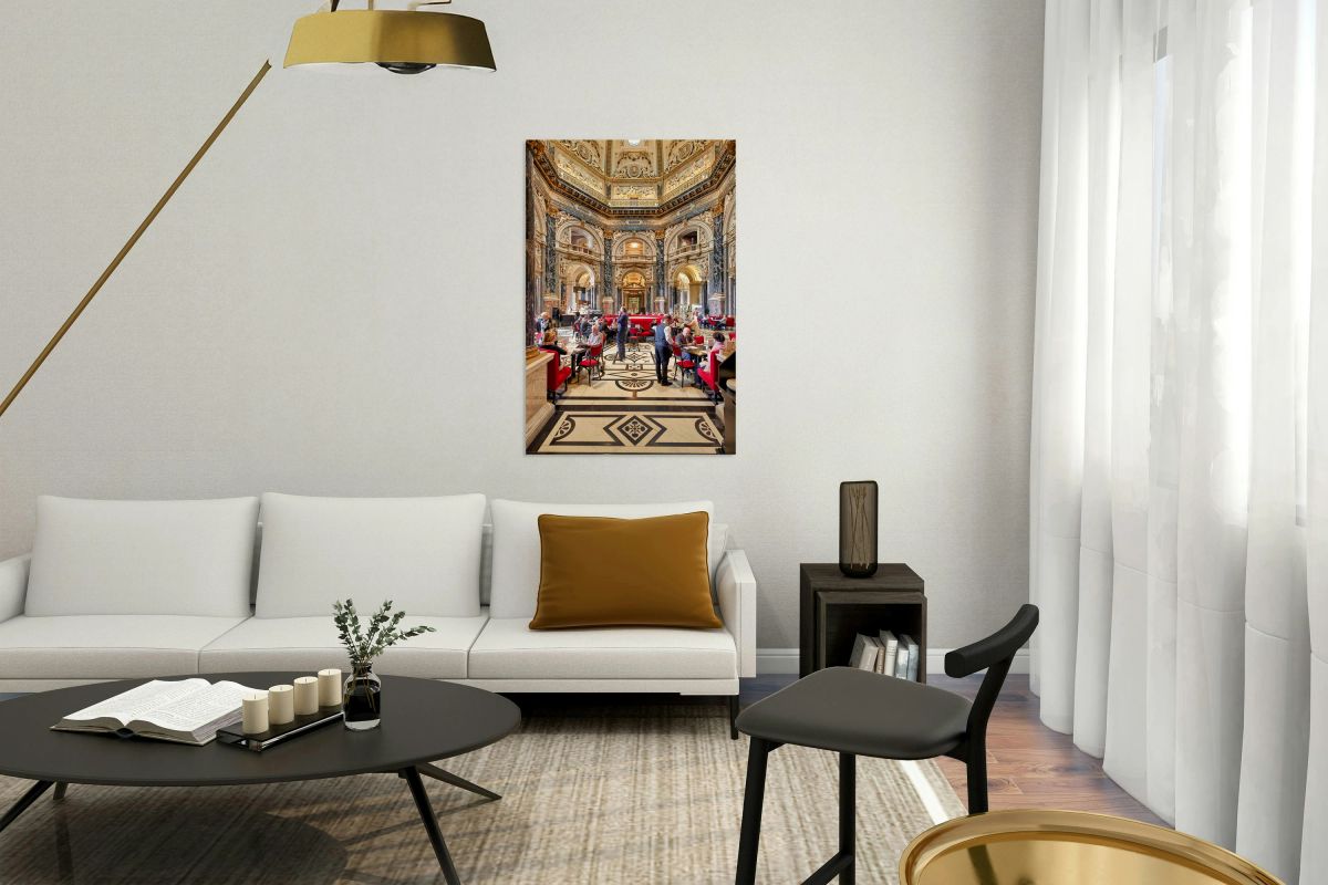 People dining in a grand ornate museum cafe.