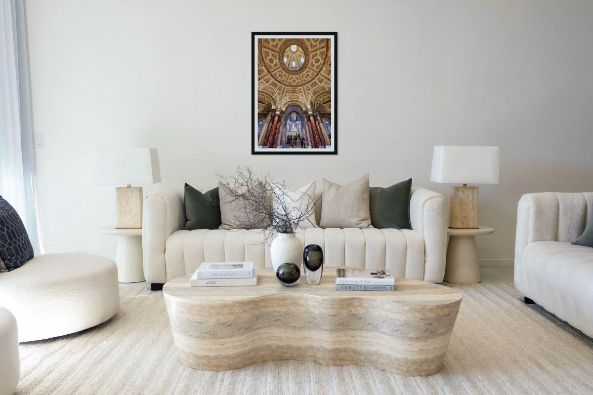 Grand museum interior with ornate dome staircase and classical
