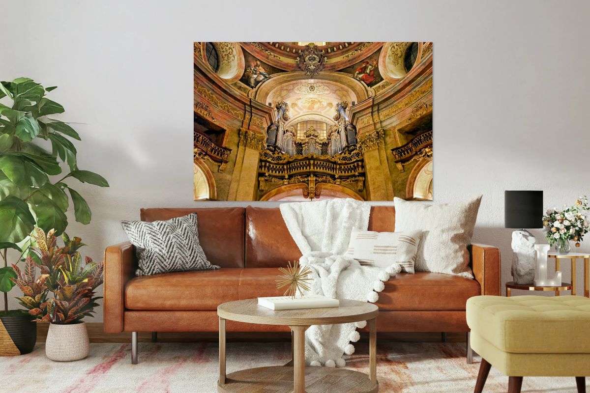 Grand baroque church interior featuring ornate organ frescoes 