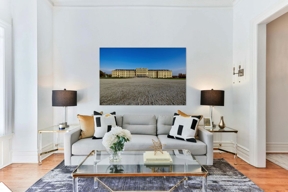 Schönbrunn Palace Vienna Austria under a clear blue sky.