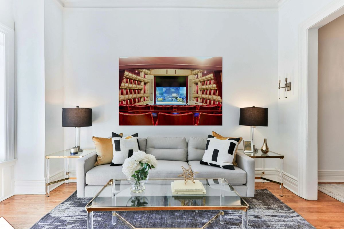 Grand opera house interior with stage crew working.