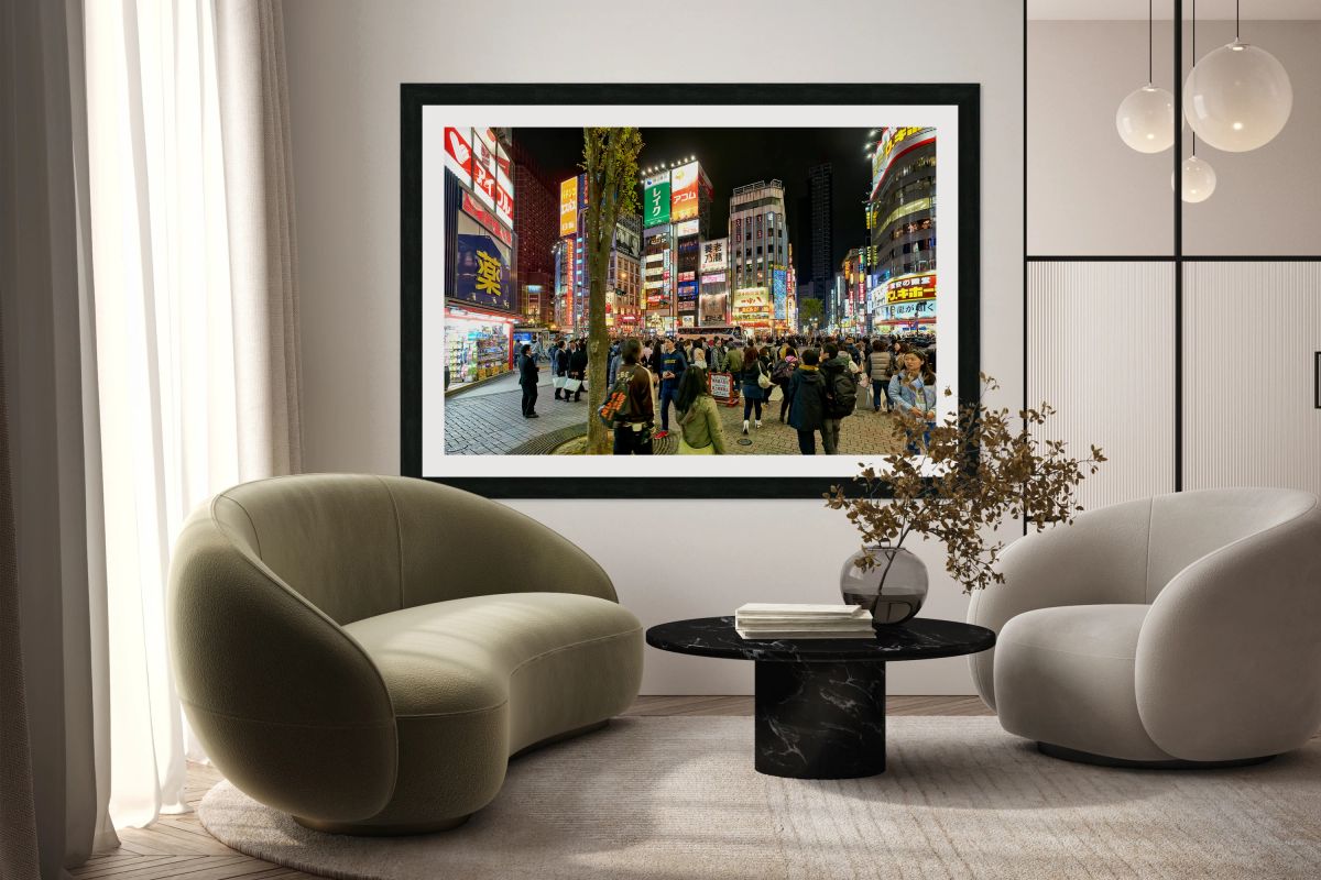 Neon lights bright in Shinjuku district of Tokyo during the nigh