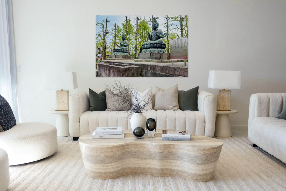 Two bronze Buddha statues at Sensoji Temple in Tokyo Japan