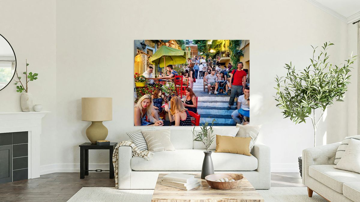 Dining and socializing in a crowded outdoor cafe in a city