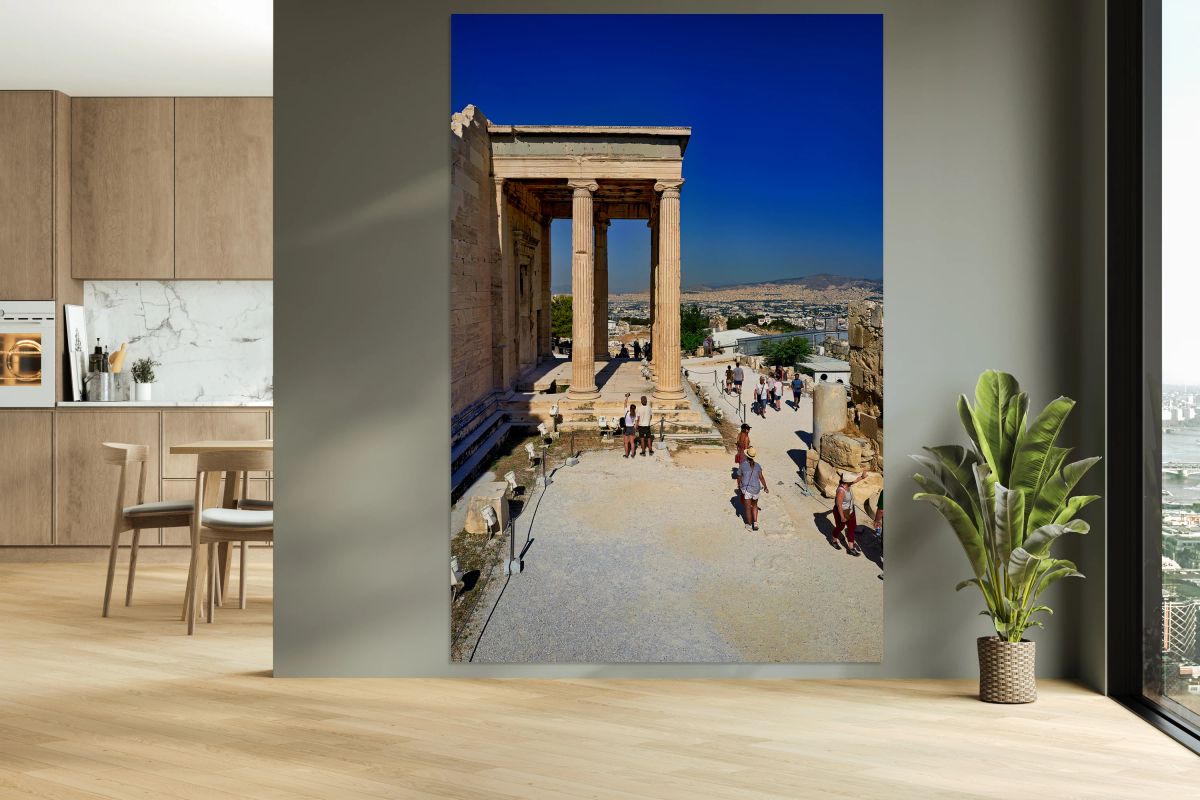 Erechtheion temple in Athens Greece shows visitors and ancient c