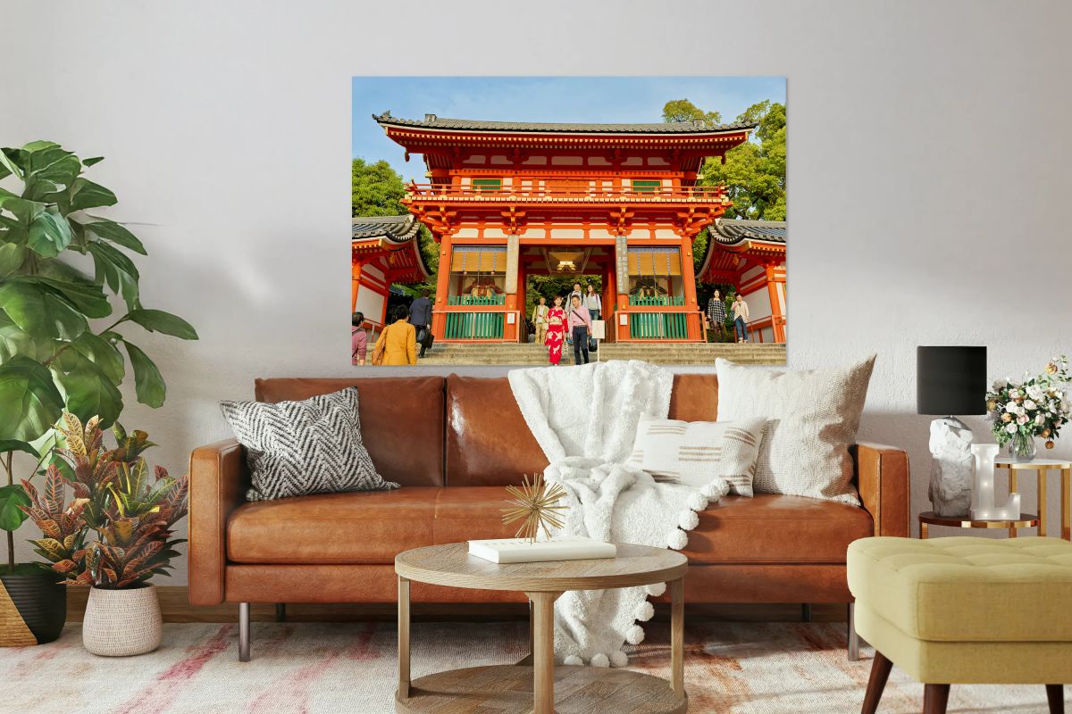 Yasaka shrine temple in Kyoto during a sunny day with visitors