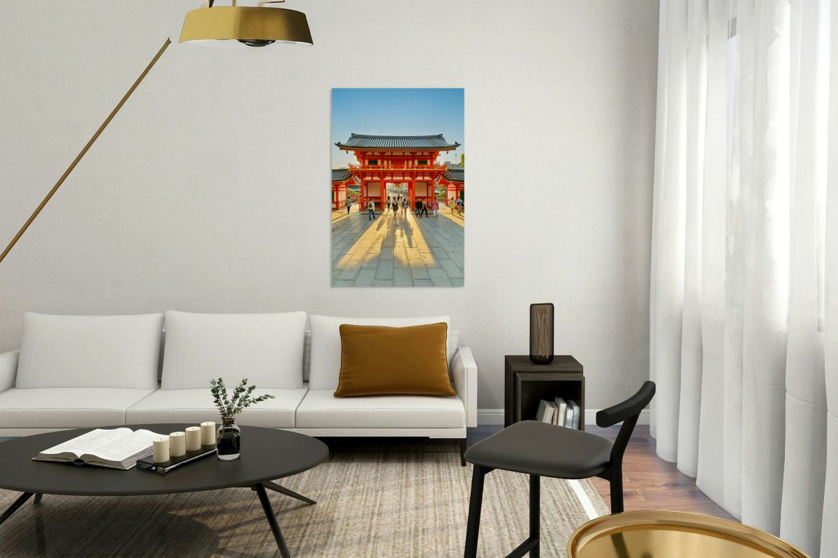 Visitors walk through the main gate of Yasaka shrine temple in K