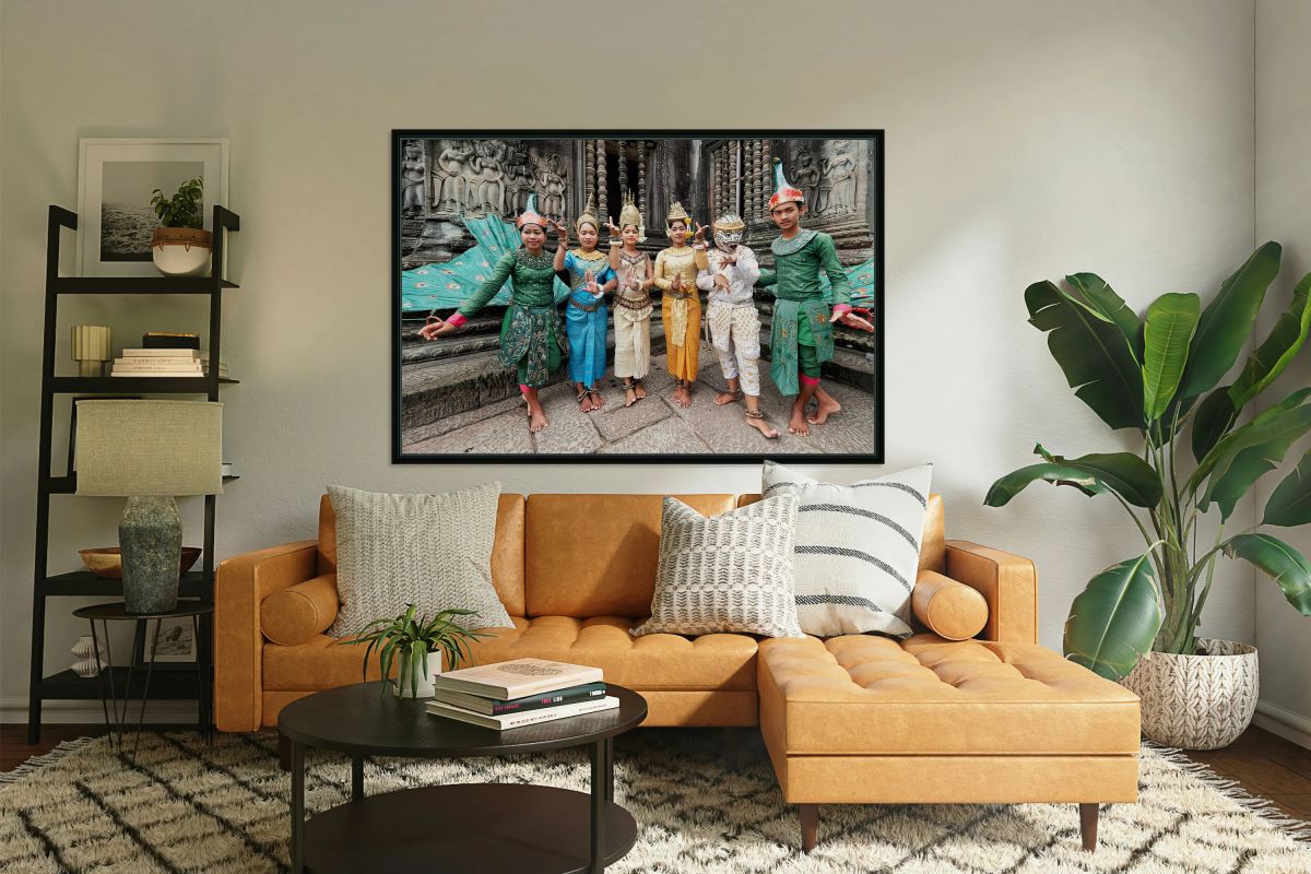 Traditional Cambodian dancers in elaborate costumes at ancient t