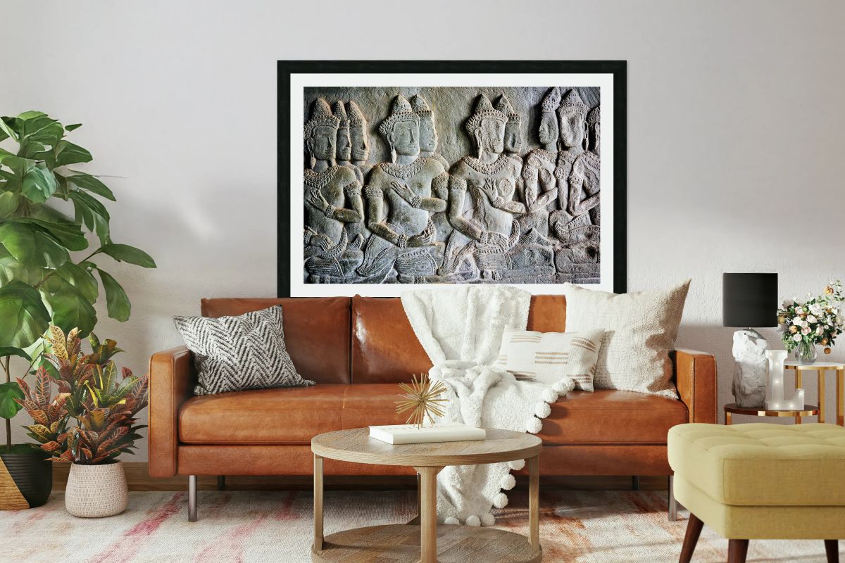 Stone bas relief of Apsara dancers from an ancient temple.
