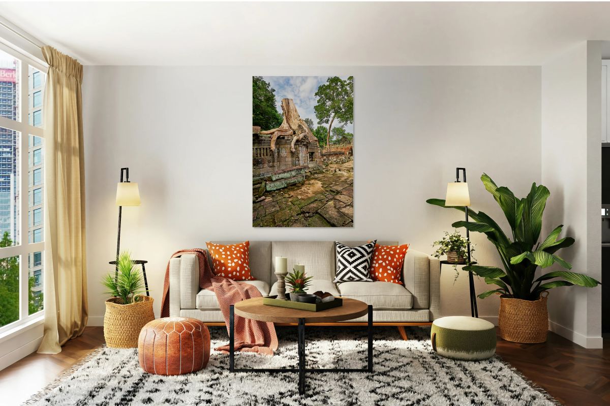 Tree roots engulf ancient temple ruins.