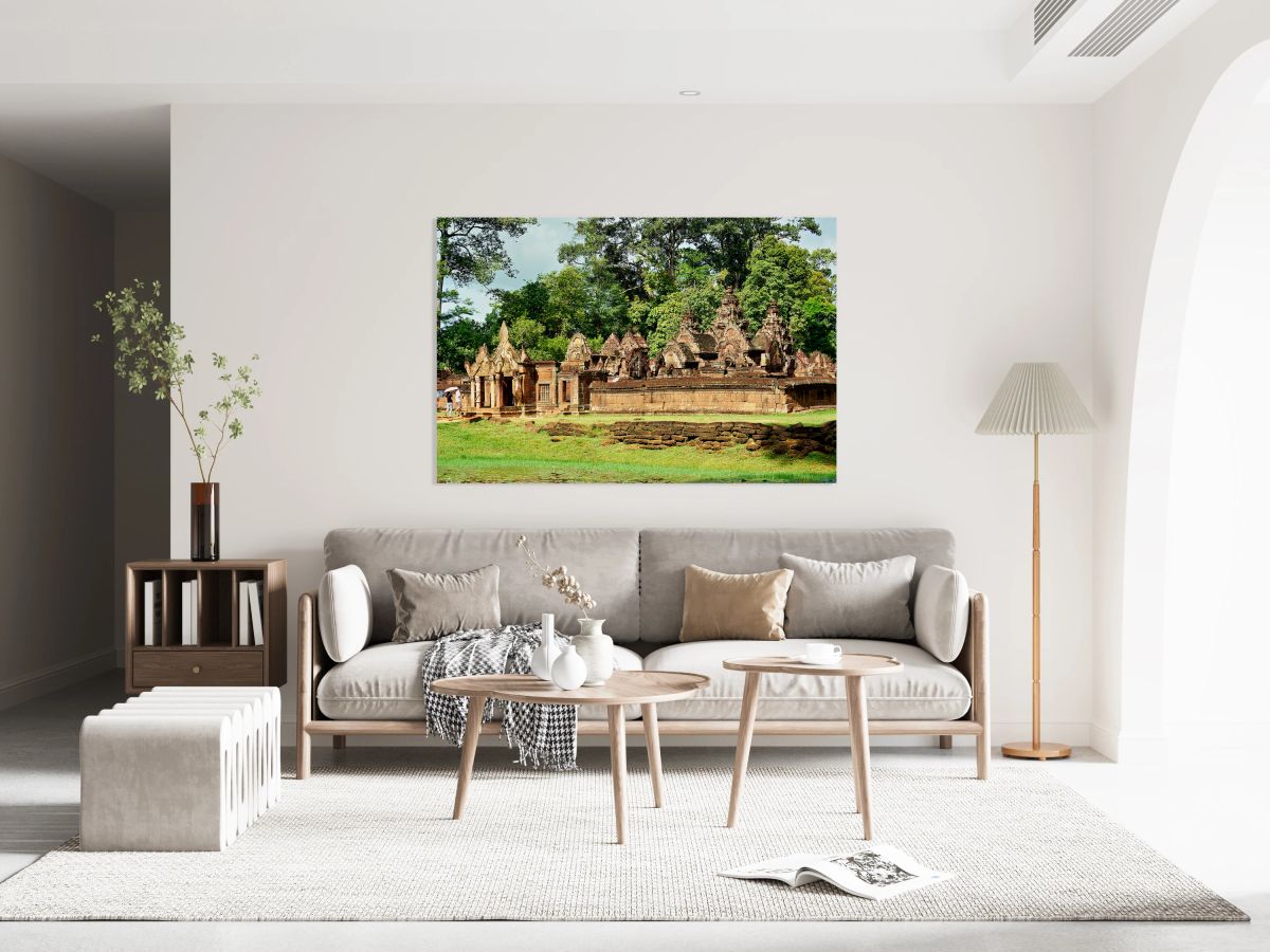 Ancient stone temple complex surrounded by lush jungle and water