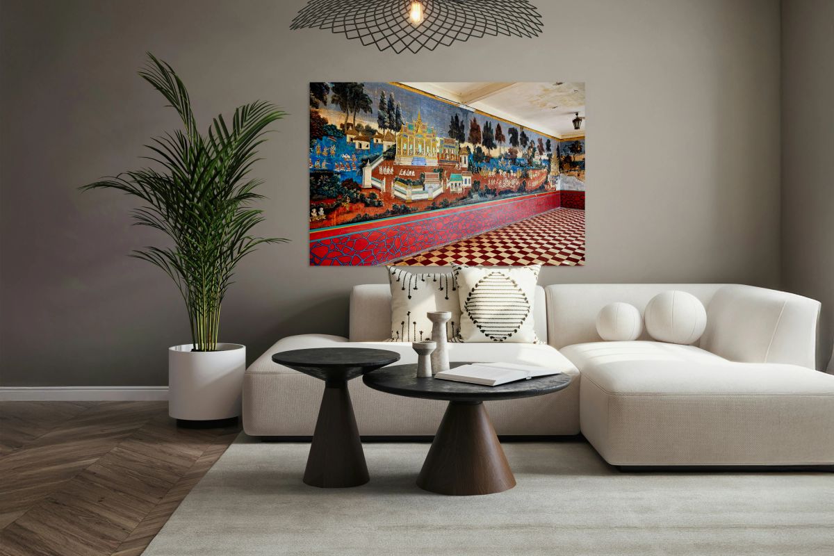 Vibrant Cambodian temple mural showcasing traditional life and a