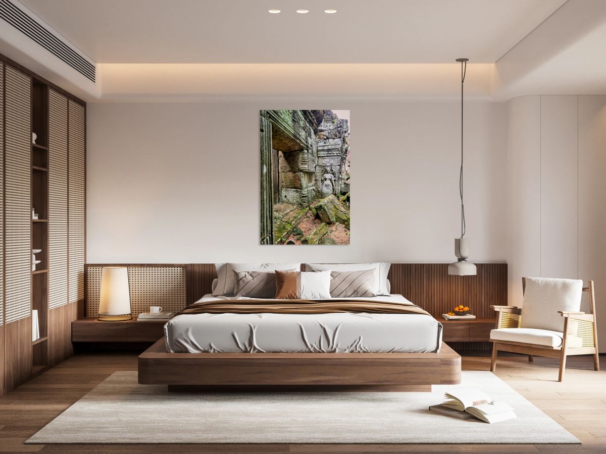 Ancient temple ruins with carved stone deity and moss.