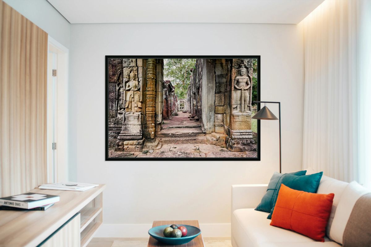 Ancient stone temple ruins with carved figures.