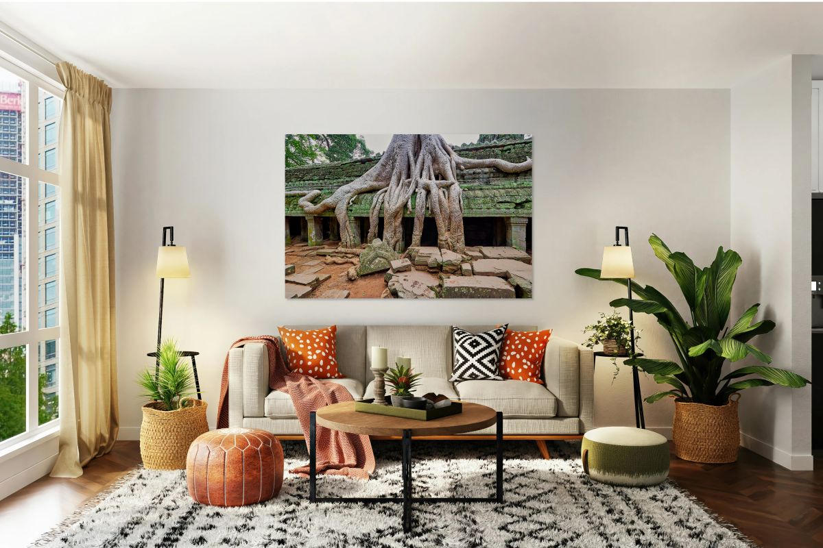 Giant tree roots engulf ancient temple ruins.