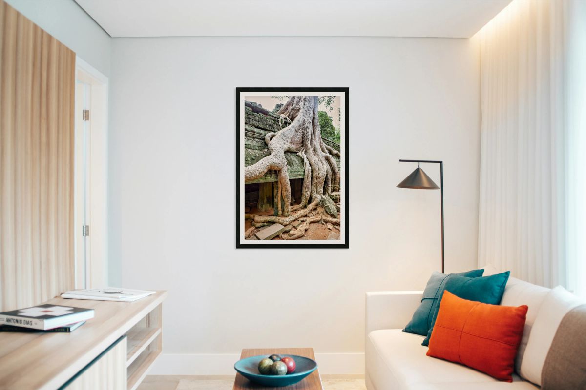 Giant tree roots engulfing ancient temple ruins.