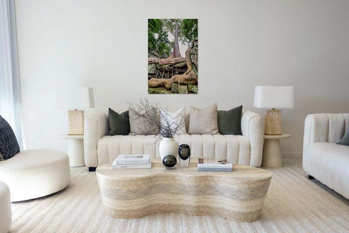 Giant tree roots engulf ancient temple ruins.