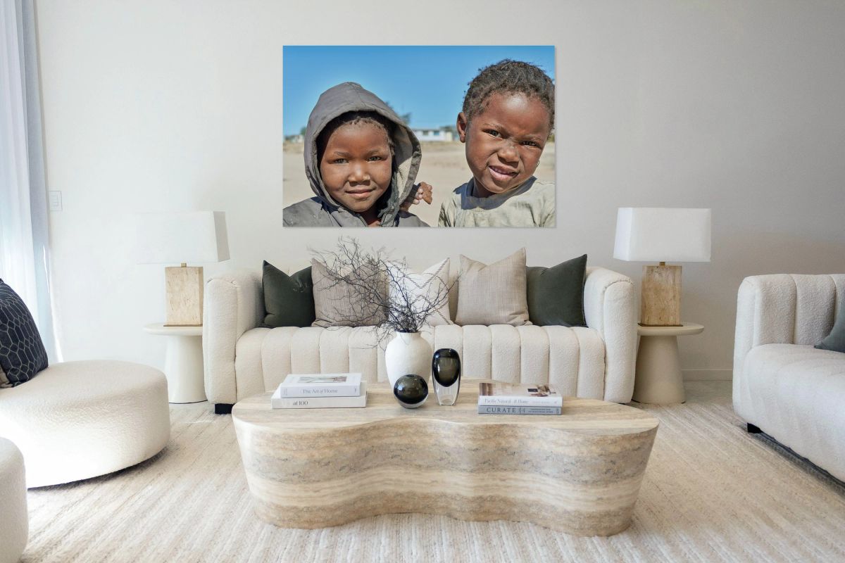 Children in Damaraland village of Namibia share a moment togethe