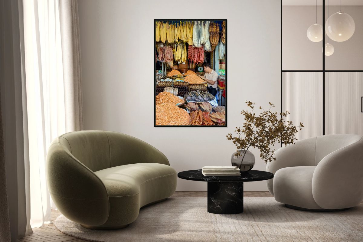 Dried fish shrimp and sausages for sale at market stall.